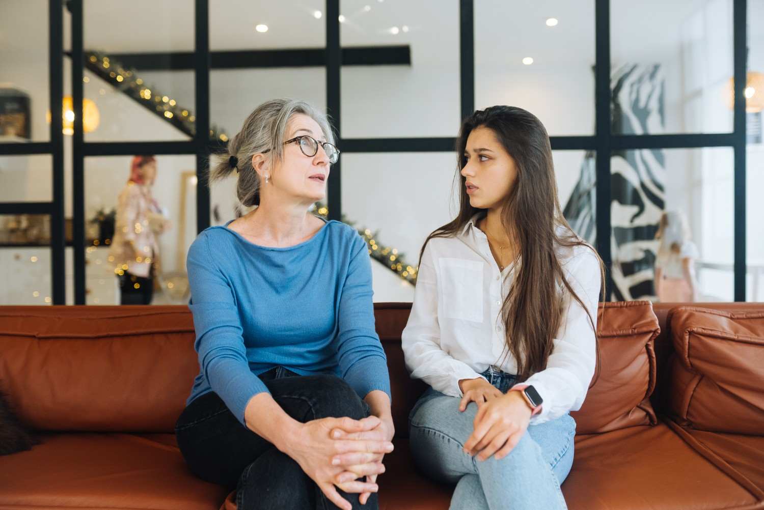Two people talking openly during a supportive conversation