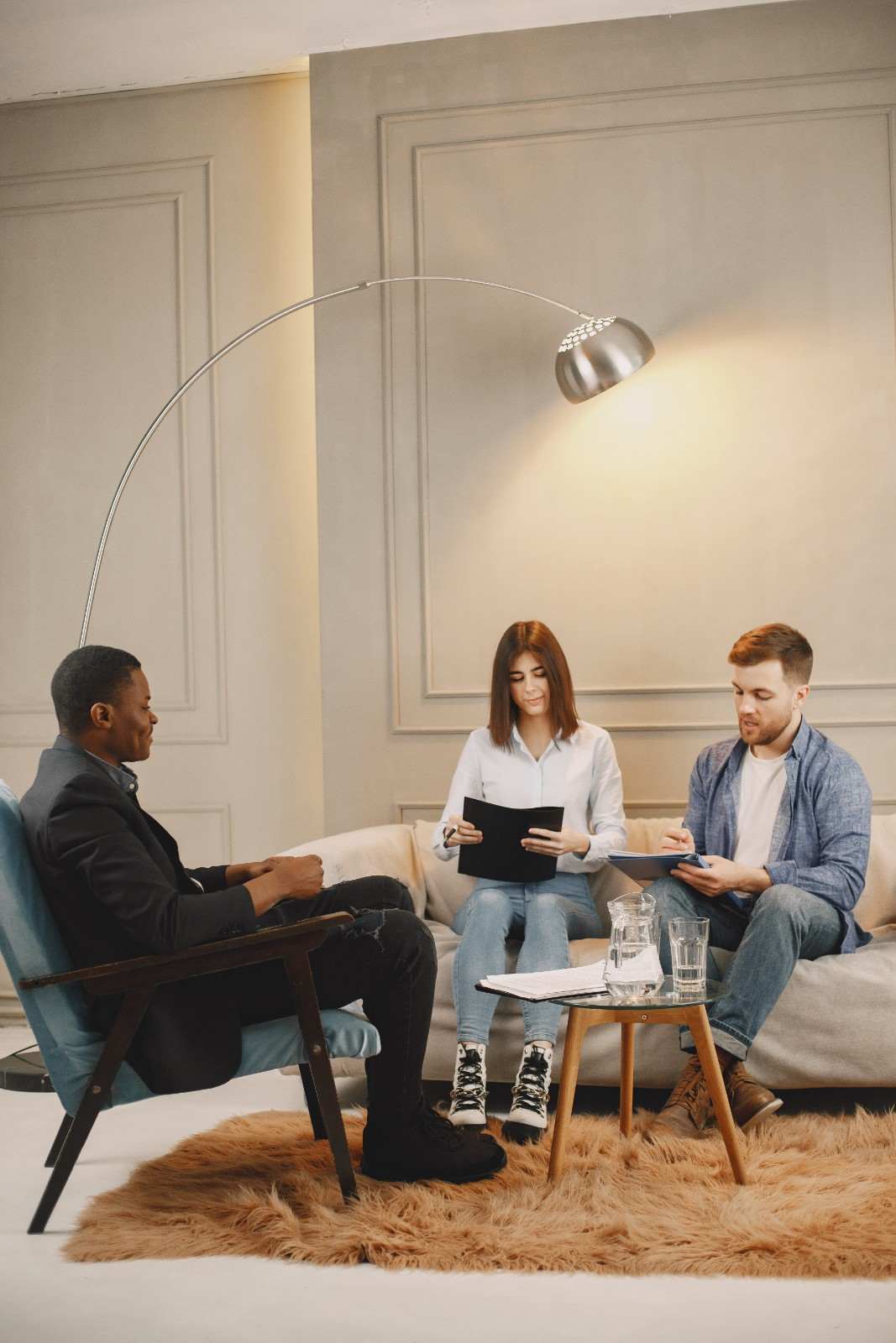 Adult sitting with a therapist during an individual counseling session