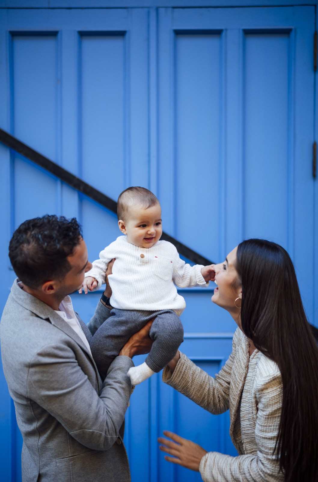 Hands offering comfort and support to a family member